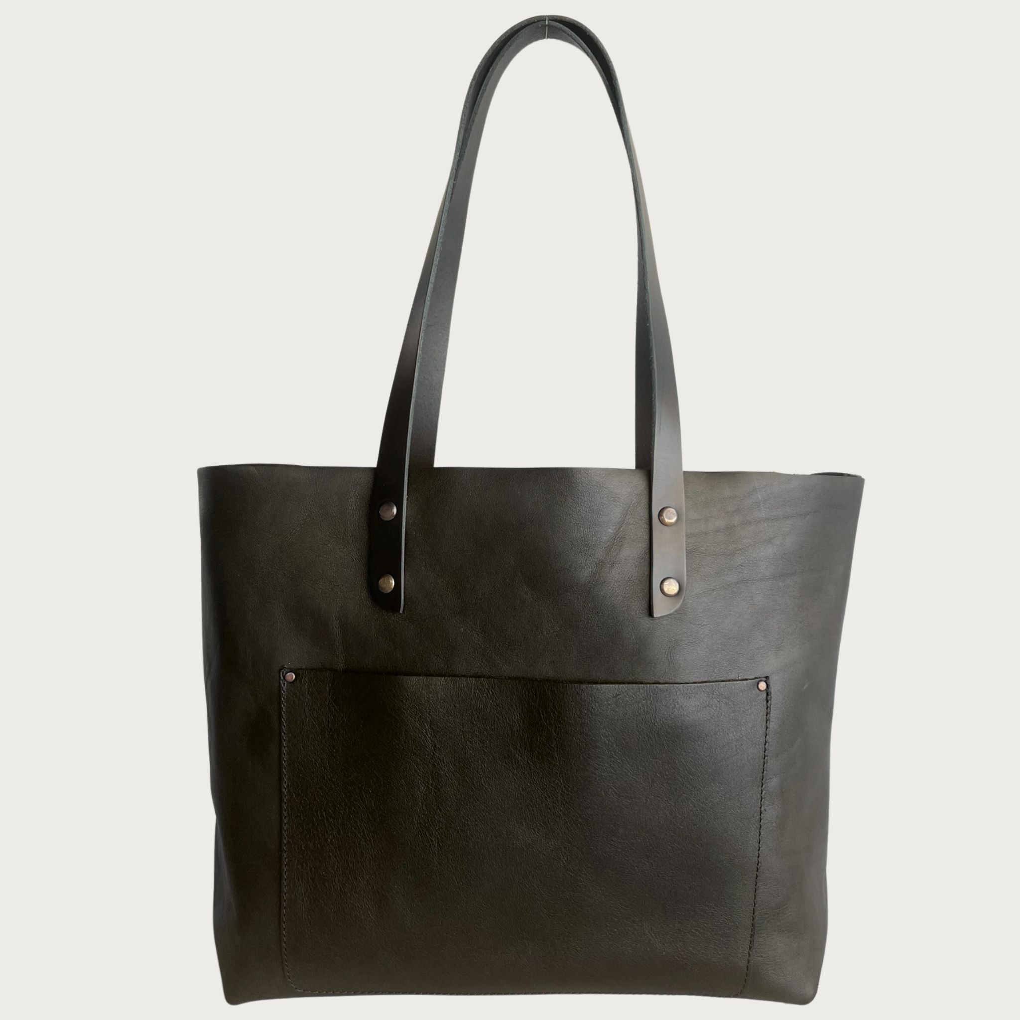 Real full-grain leather tote by OAK & ELK, compared with vegan leather alternatives