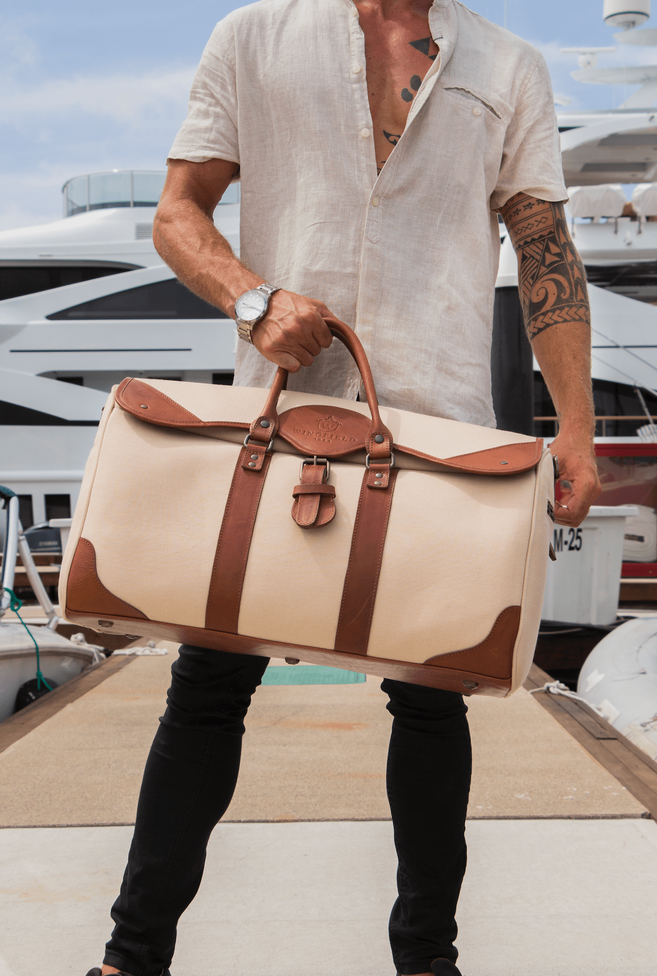 Full men’s collection – including leather duffels, wallets, messenger bags, and more.