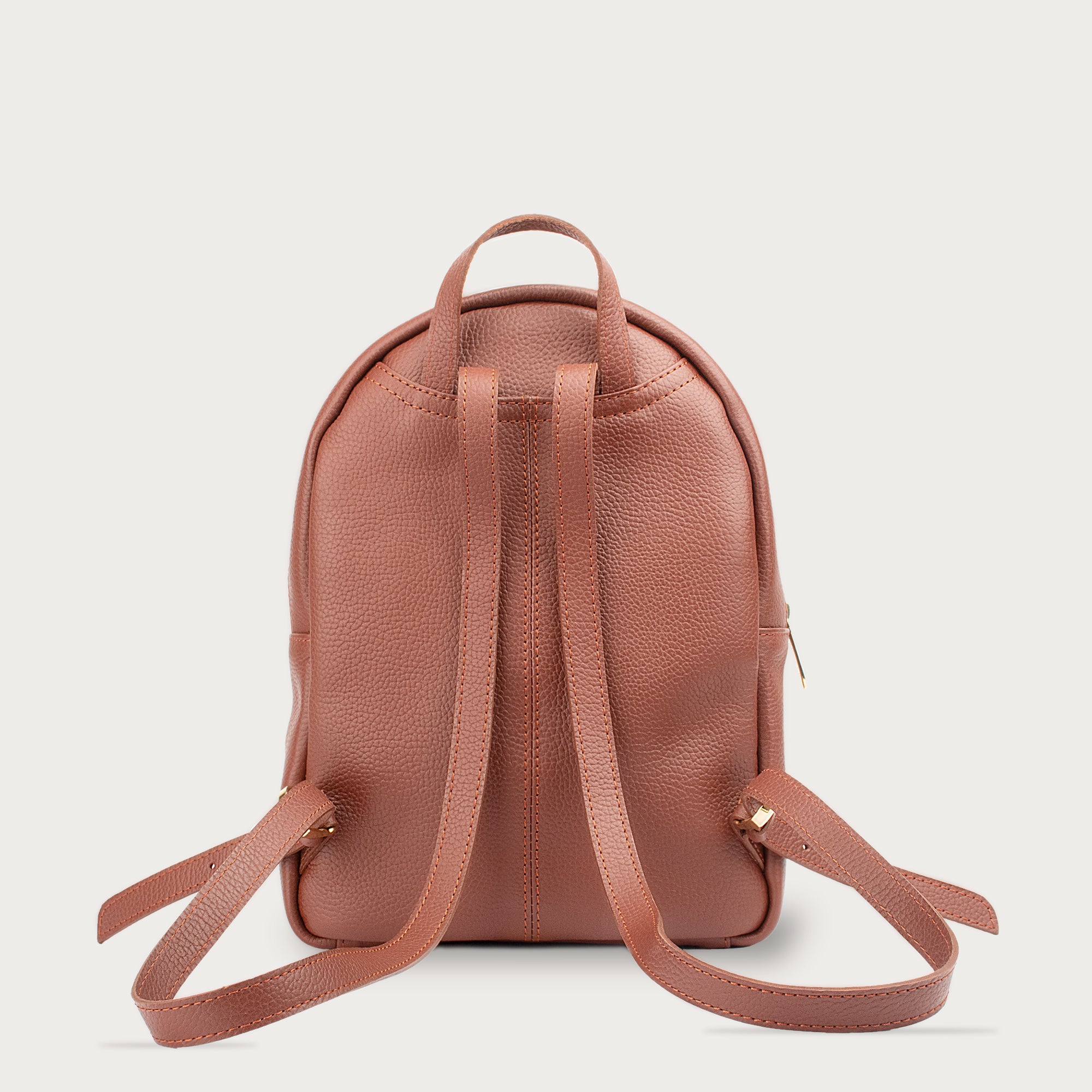 Leather backpack with smooth finish, adjustable straps, front zipper pocket, and gold hardware – Emma by OAK & ELK.