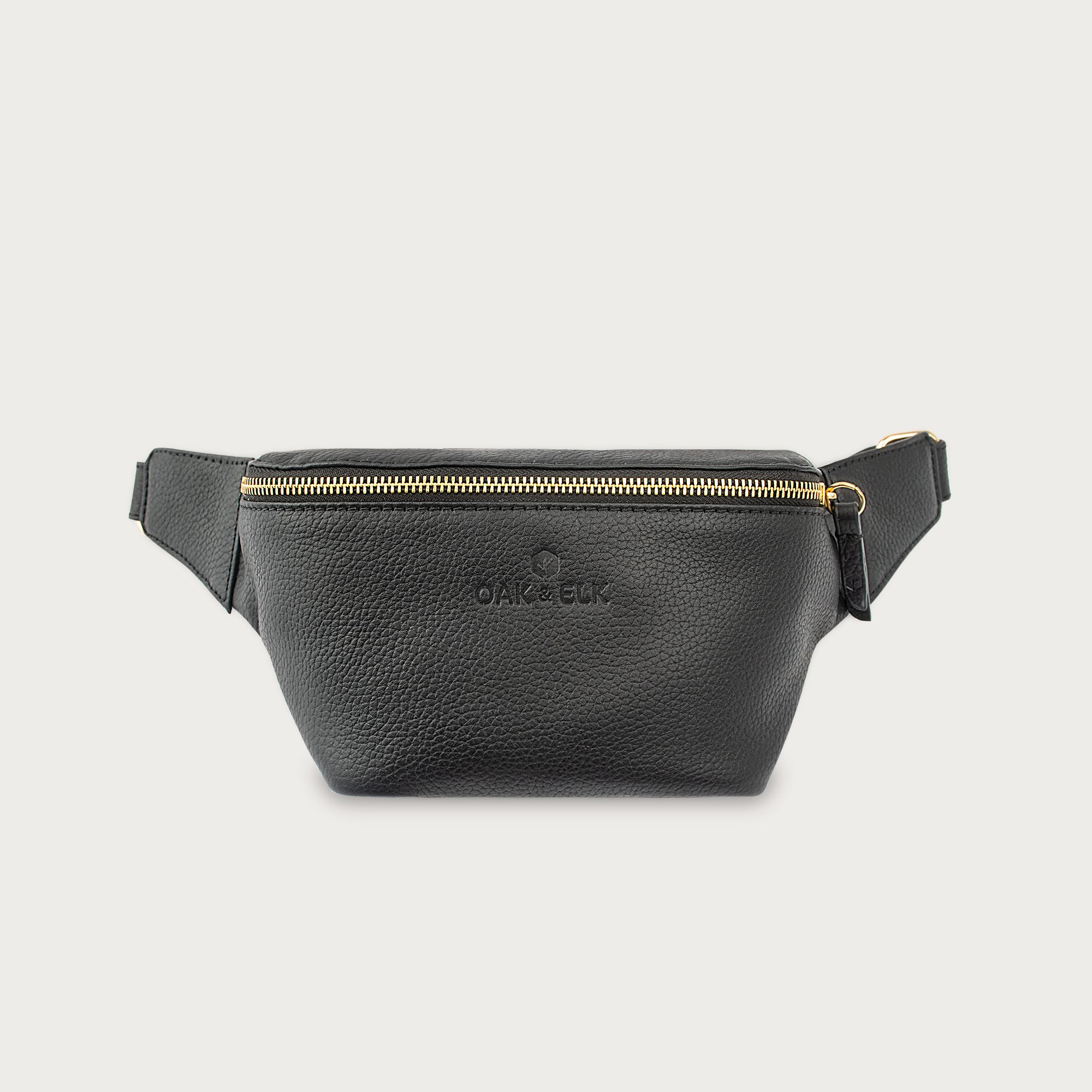 Black leather fanny pack with multiple compartments, zipper pockets, and adjustable strap — sleek and practical for daily use