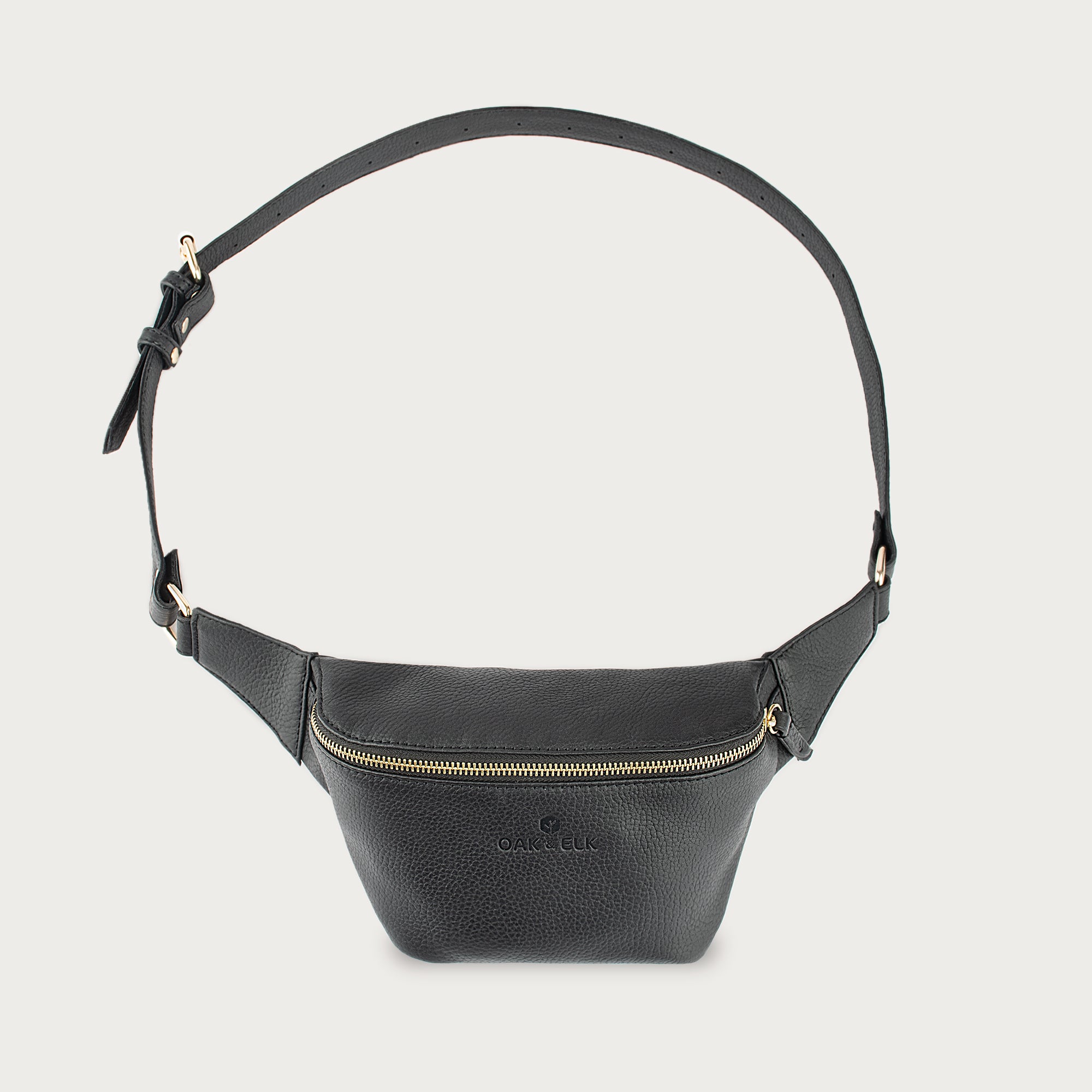 Black leather fanny pack with multiple compartments, zipper pockets, and adjustable strap — sleek and practical for daily use