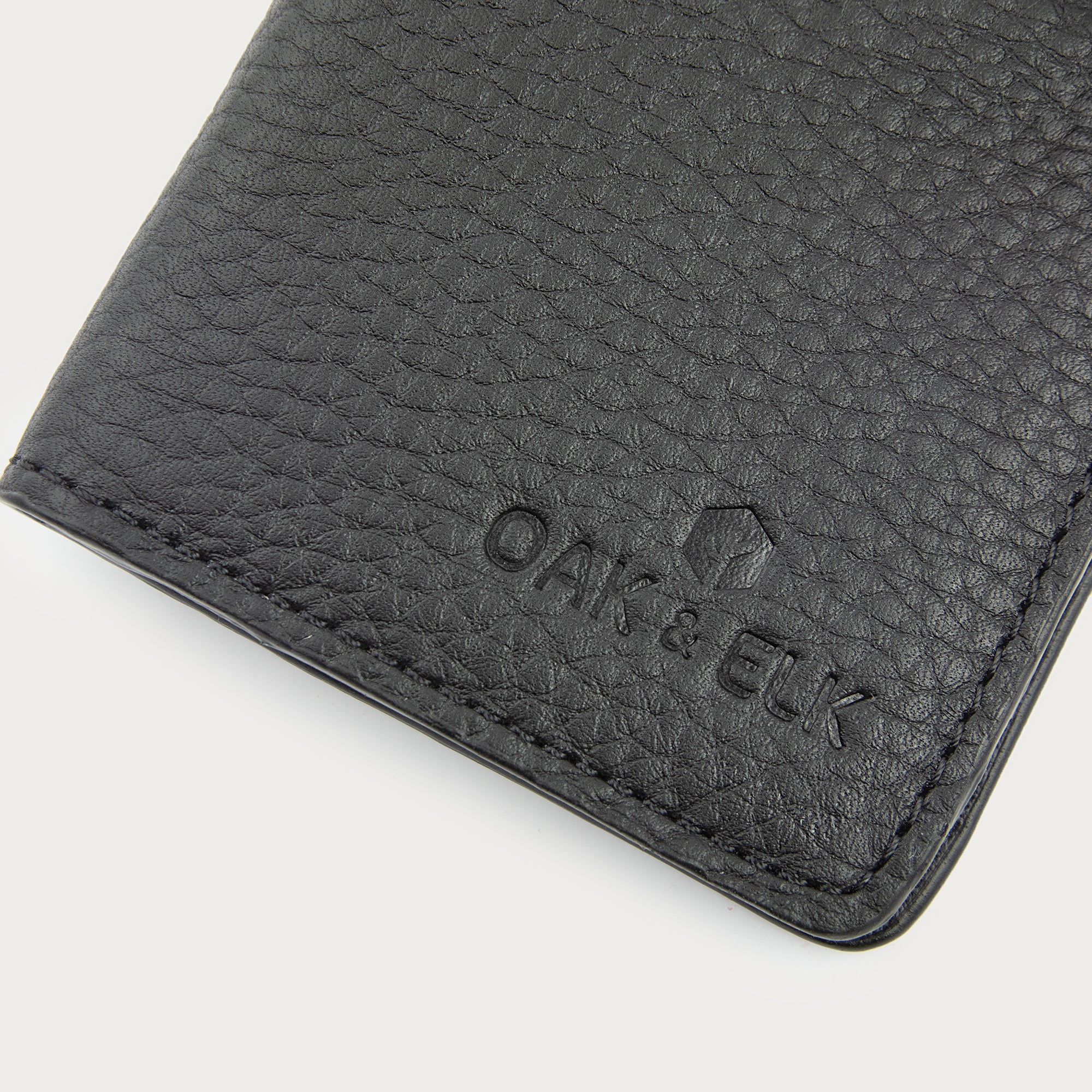 Slim leather pocket organizer with card slots and central pocket — ideal for minimalist everyday carry. OAK & ELK.