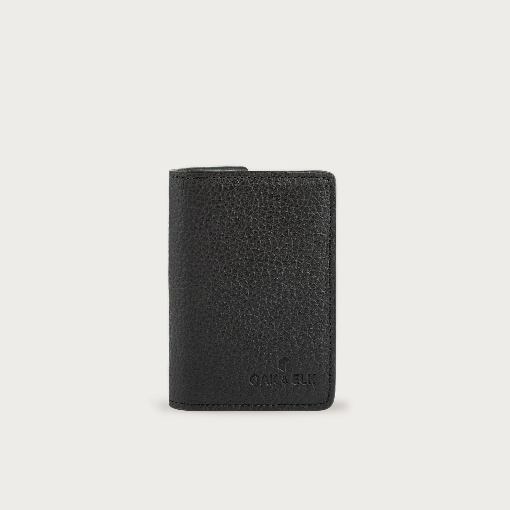 Slim leather pocket organizer with card slots and central pocket — ideal for minimalist everyday carry. OAK & ELK.