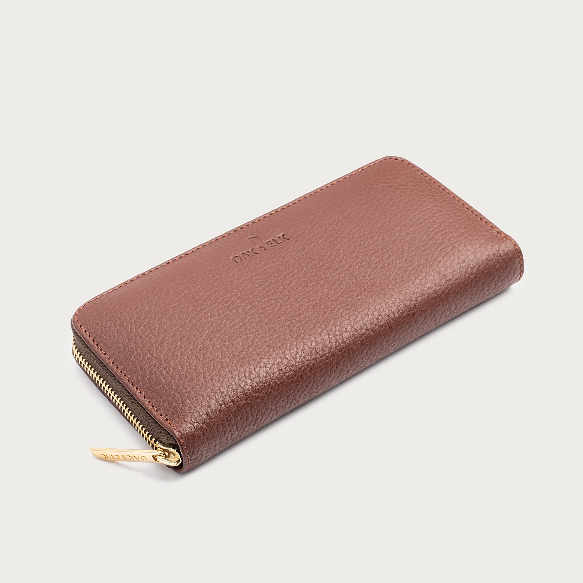 Large leather wallet with zipper closure and card slots — perfect for essentials and everyday carry.