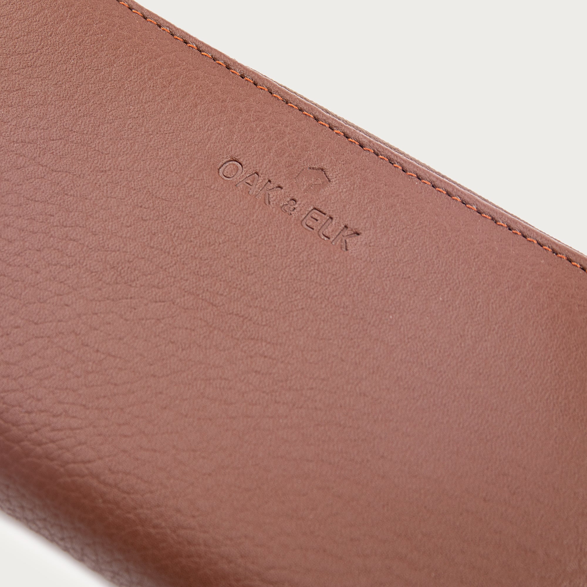 Large leather wallet with zipper closure and card slots — perfect for essentials and everyday carry.