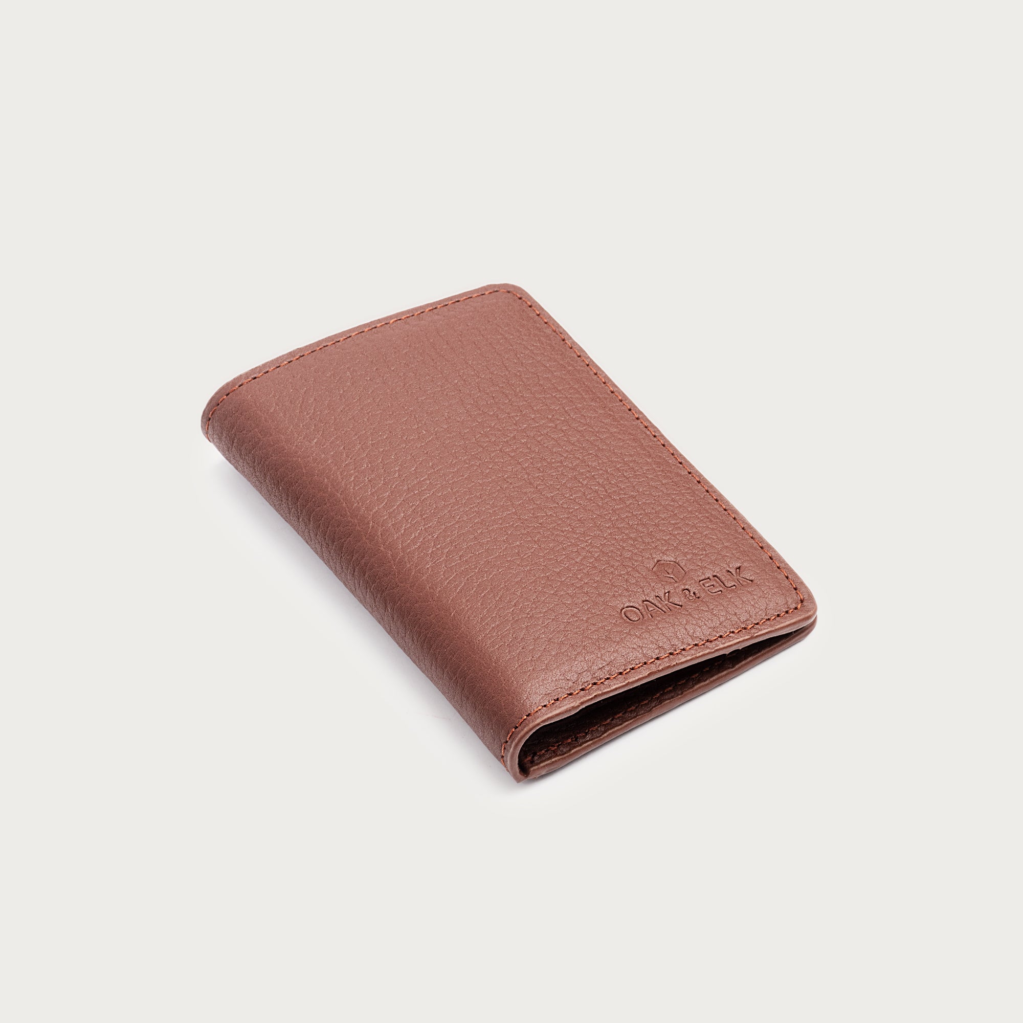 Slim leather pocket organizer with card slots and central pocket — ideal for minimalist everyday carry. OAK & ELK.