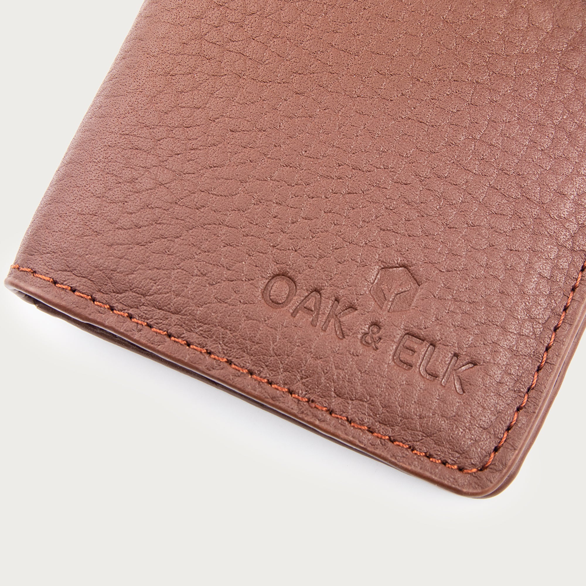 Slim leather pocket organizer with card slots and central pocket — ideal for minimalist everyday carry. OAK & ELK.