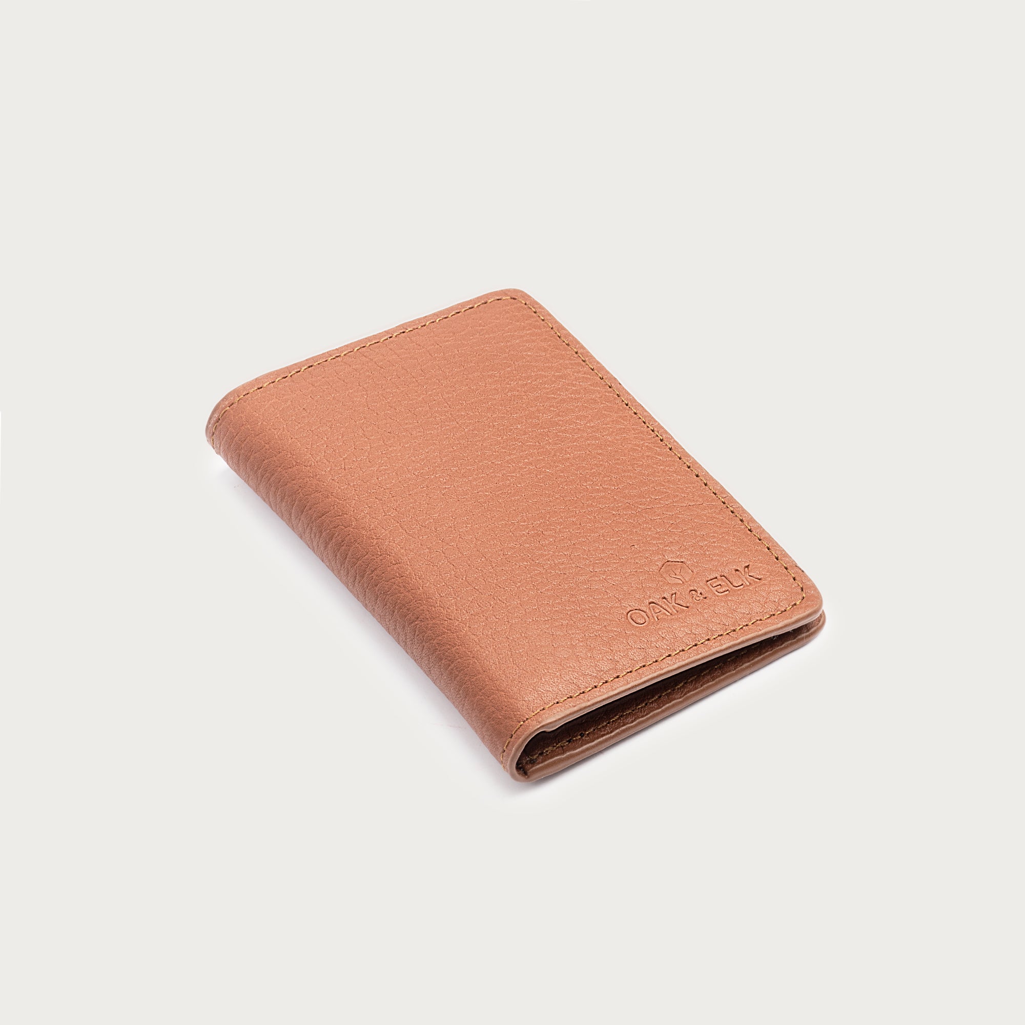 Slim leather pocket organizer with card slots and central pocket — ideal for minimalist everyday carry. OAK & ELK.