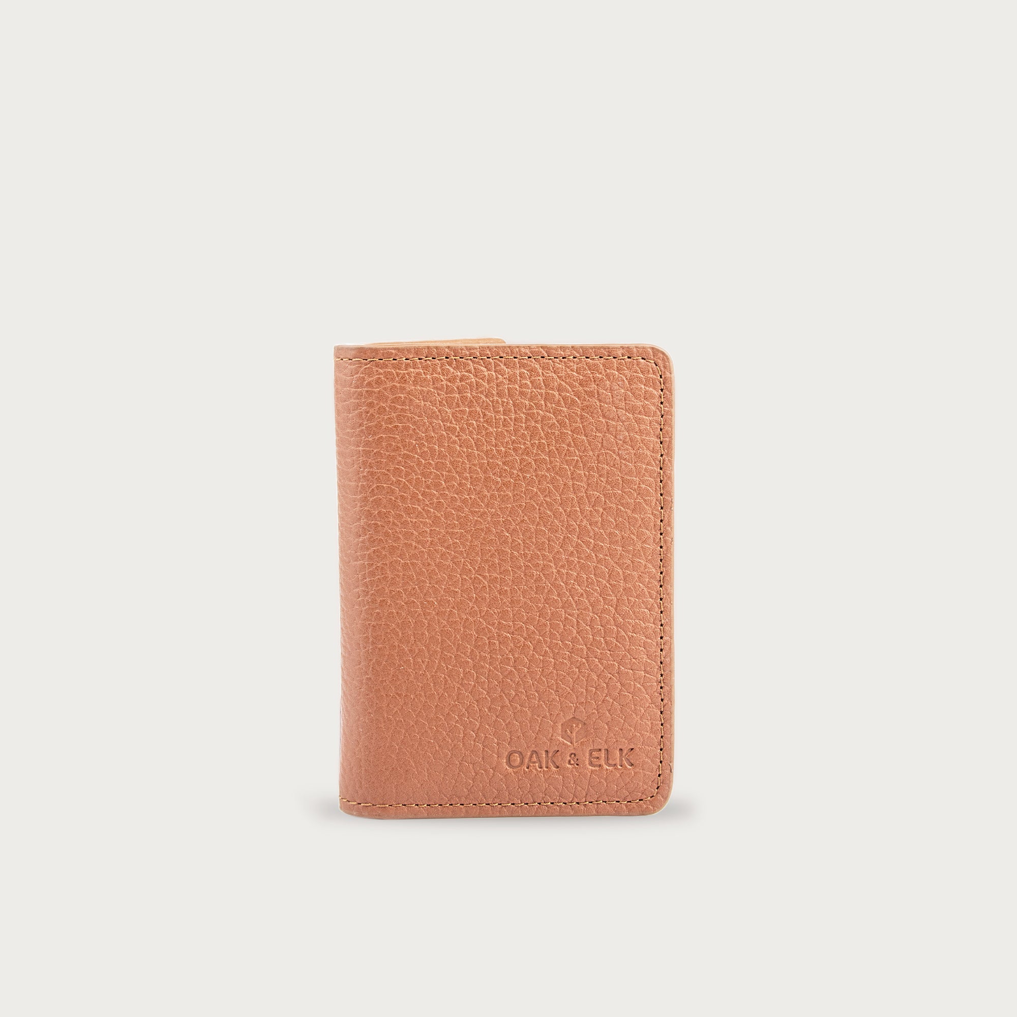 Slim leather pocket organizer with card slots and central pocket — ideal for minimalist everyday carry. OAK & ELK.