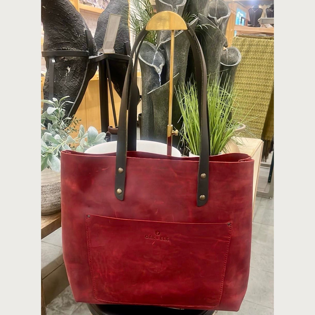 Red full-grain Classic Leather Tote from OAK & ELK, front view, a bag that develops leather patina with use